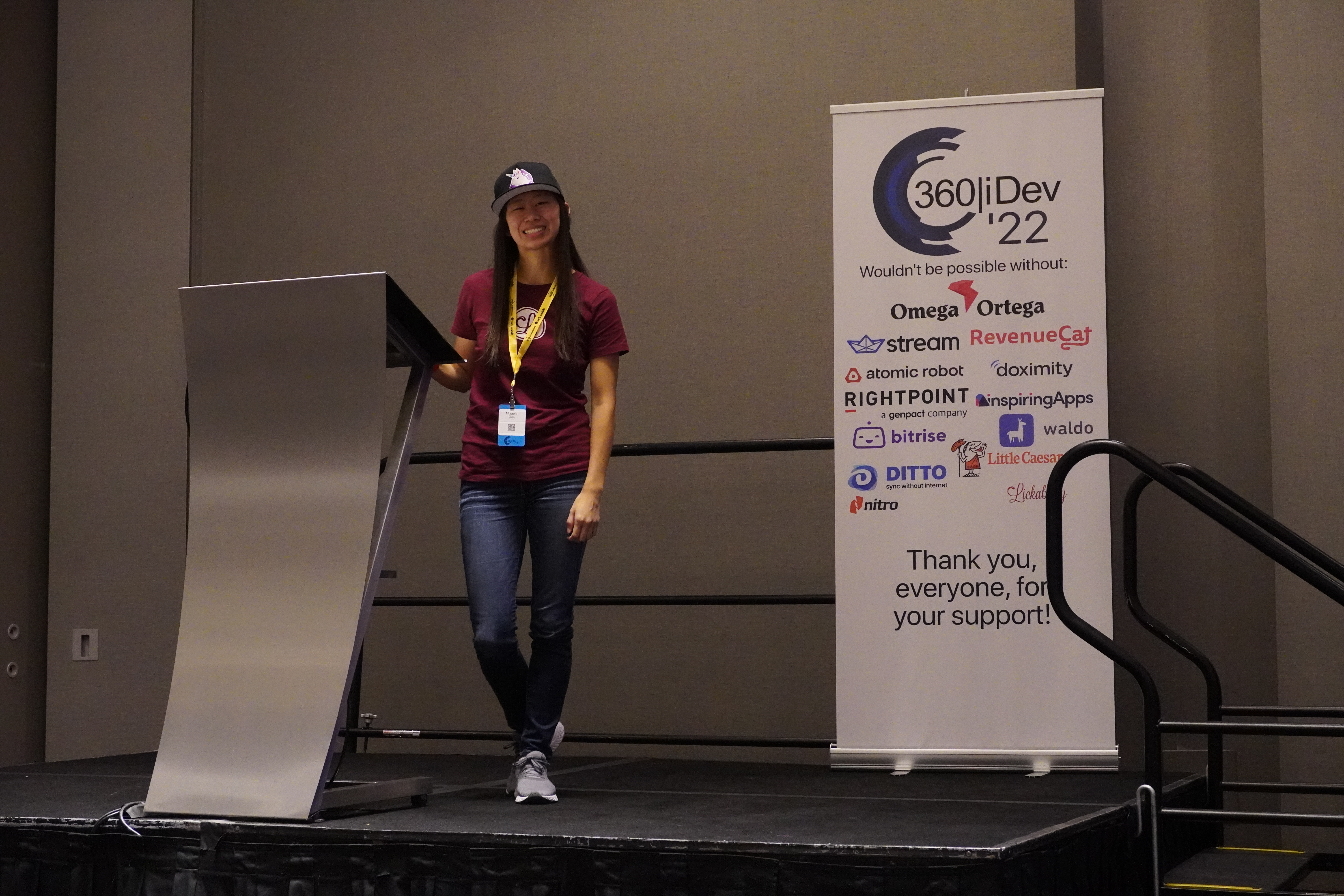 Mikaela Caron on stage for her talk at 360iDev