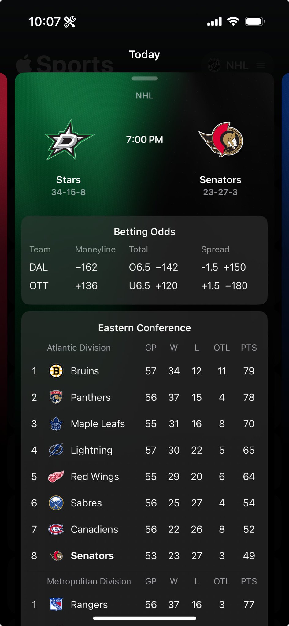 The details for an upcoming game, with betting odds and division standings on a translucent platter. The headers use vibrancy, with a bit of the background color coming through.